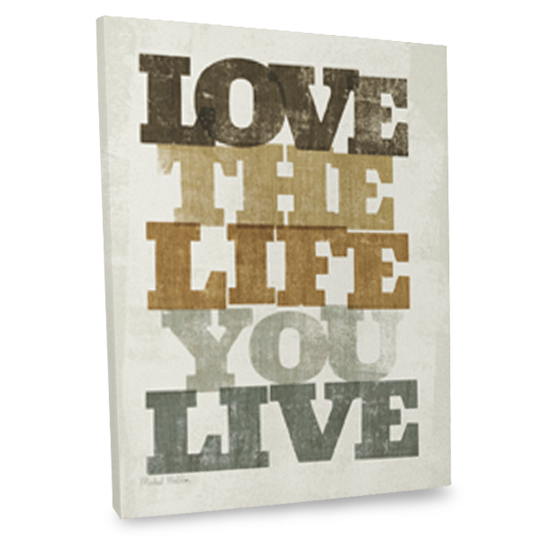 Add an inspiring twist to your decor with our love the life your live quote canvas.