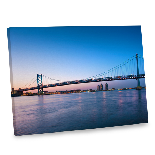 Add intrigue to your distinctive home decor with our wall canvas depicting a bridge at dusk.